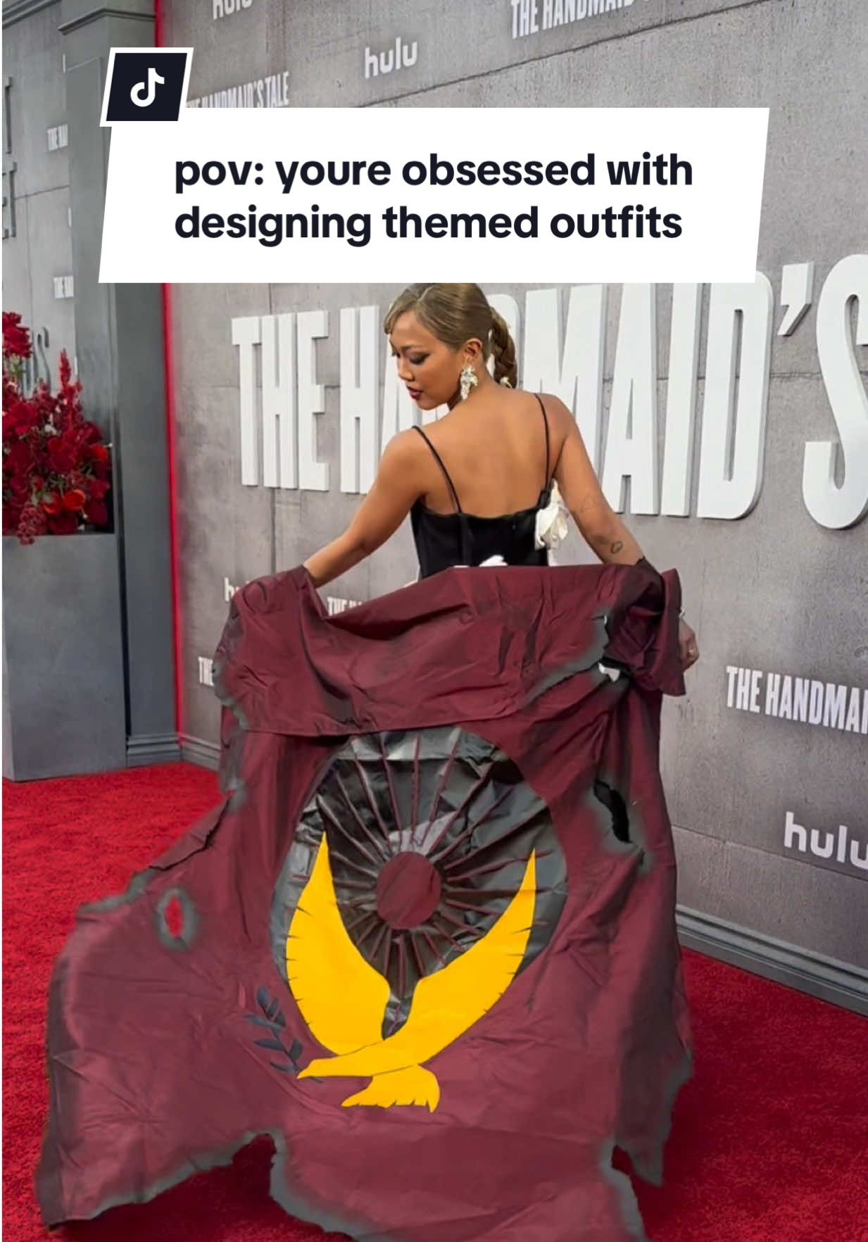 Well if America ever turns into Gilead, I already have a flag to wave 🙂‍↔️ thank u to the hulu team for actually letting me fake burn a Gilead flag for the carpet! @handmaidsonhulu #thehandmaidstale