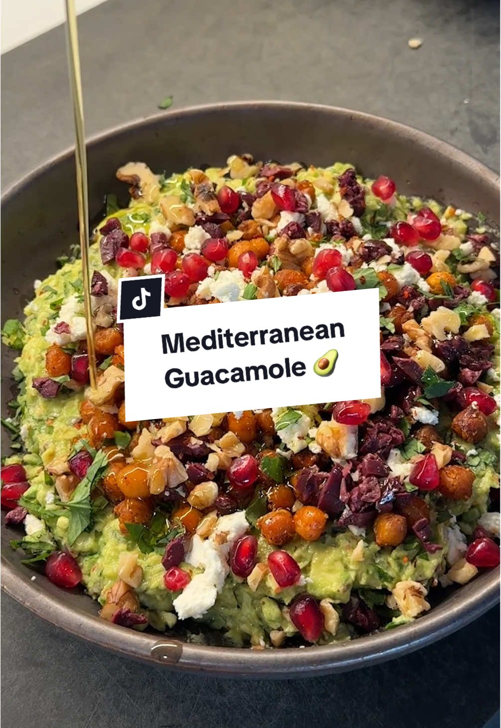 Mediterranean-Inspired Guacamole Guac is one of my favorite dips, so I decided to load it up with some big & bold Mediterranean flavors with crispy oven roasted chickpeas, some pomegranate, feta cheese, black olives, walnuts, and fresh herbs. As with regular guac, the key is to use cold avocados right out of the fridge. Trust me, chilling your avocados and veggies beforehand makes all the difference. Here is how to make it: 1️⃣ Start with cold ingredients. Make sure the avocados and veggies are in the fridge for at least 2 hrs before making this.  2️⃣ Prep the mix-ins first… Finely dice ½ red onion, 1 jalapeño (remove the seeds if you want less spicy), & 1/3 cup fresh  cilantro. Mince 2 fresh garlic cloves.  3️⃣ Mash the avocados. Slice open 3 avocados, remove the pit and skin, and mash with juice of 1 lime, ½ tsp Aleppo or chili pepper, and a couple generous pinches salt. I like it somewhat chunky, but you decide what you like. 4️⃣ Make the crispy chickpeas. Toss 1 can of drained chickpeas with 2 tbsp olive oil, 1 tsp smoked paprika, and ½ tsp garlic powder. Roast at 400°F for 28-30 mins until crispy.  5️⃣ Finally, load it up: add 2 tbsp crumbled feta, ½ cup pomegranate seeds, 2-3 tbsp crushed toasted walnuts, 2-3 tbsp finely diced olives, a handful of fresh mint or parsley, and a drizzle of GOOD olive oil. This would be perfect with your favorite vessel of choice (chips, crackers, veggies), as a sandwich spread, or crowned over any protein. If you try it, let me know on SHREDHAPPENS! #lowcarb #lowcarbrecipes #guac #sauces #keto #ketorecipes #healthyrecipes #goodmoodfood #healthyfoodshare #mediterraneanfood