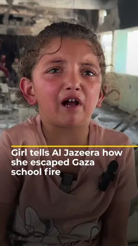 Ward al-Sheikh Khalil, a young Palestinian girl, spoke to Al Jazeera after surviving an Israeli airstrike on a school-turned-shelter in Gaza city. Video showed her walking among the flames of the fires that broke out. The attack killed over 36 Palestinians, including her mother and siblings. #news