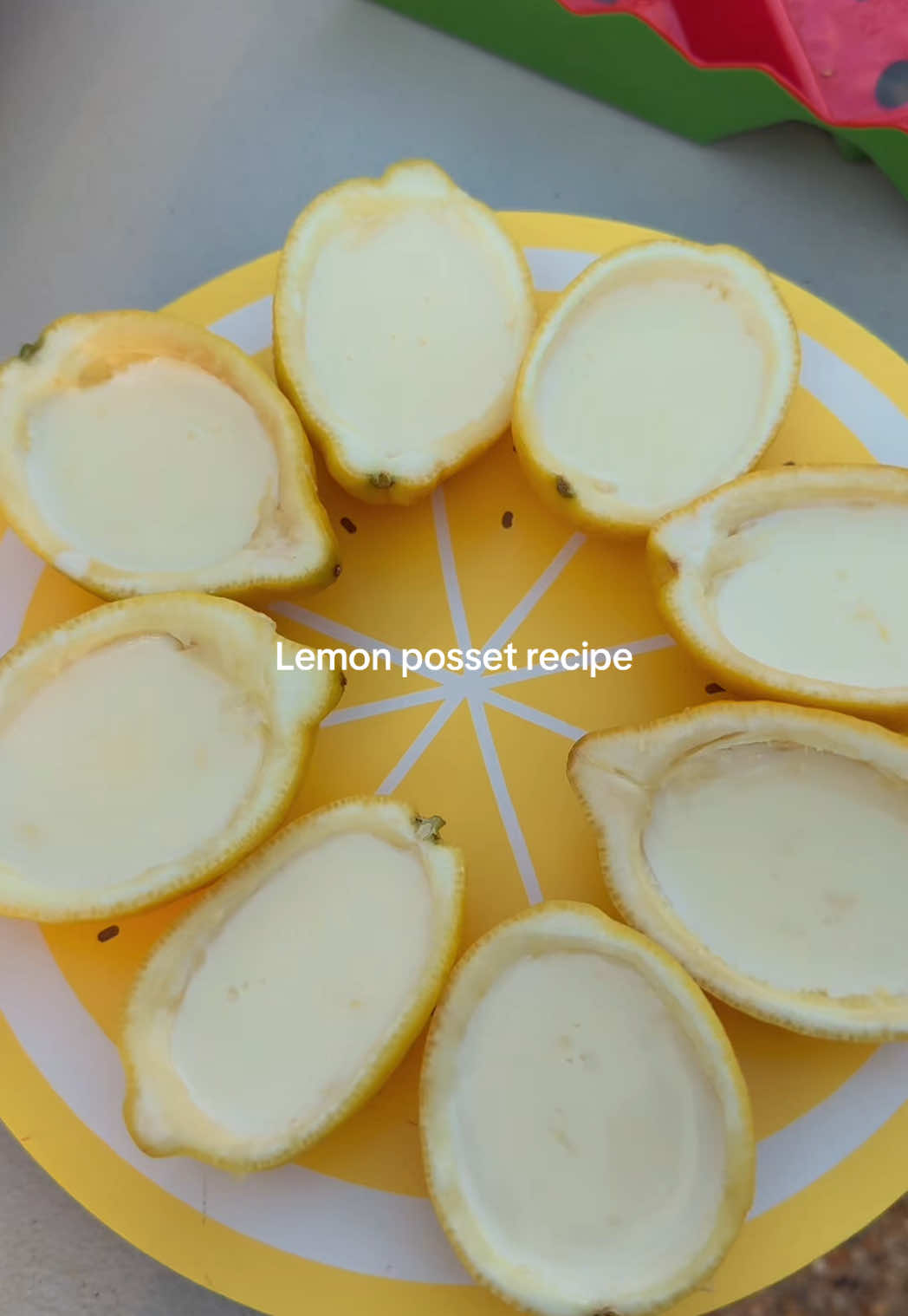 Lemon 🍋 posset recipe- 1. Cut lemons lengthwise 2. Scoop out all the lemon pulp 3. Squeeze out all the juice and sieve it 4. In a saucepan, take 14 oz heavy cream and add 2/3 cup sugar to it 5. Let it simmer for 5 mins, keep stirring it 6. Add lemon zest to it 7. Take it off the heat, once it’s slightly cooled add 6-7 tbsp lemon juice to it. Taste it, if its not tangy add some more 8. Once its cooled down, fill the lemon shells with the mixture  9. Refrigerate it for at least 3-4 hours 10. Top it off with crushed graham crackers, or pistachios or torch it for creme brûlée effect or as is! Enjoy🍋 Save and share and let me know you like it💛 #lemonposset #egglessdesserts #egglessrecipe #lemondessert #summerdessert #summerfeels #lemonpossetrecipe 