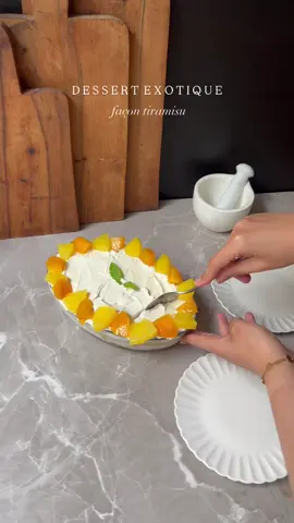 Dessert façon tiramisu fruité sans œuf frais, exotique et léger  Ingrédients:  Biscuits boudoir  200ml crème liquide sucre  200gr mascarpone  Coulis de mangue  Ananas conserve  Mangue fraîche  Instructions:  Commence par préparer la crème, en faisant monter la mascarpone avec de la crème liquide et coulis de mangue  Trempe rapidement les boudoirs dans le sirop d’ananas et dispose une première couche au fond. Ajoute une belle couche de crème mascarpone. Verse une poignée de dés d’ananas et de mangue frais. Recommence : boudoirs trempés, crème mascarpone. Laisse reposer minimum 4h au frais (idéalement une nuit) pour que les boudoirs s’imprègnent bien. Juste avant de servir, décore avec un peu de menthe, de noix de coco râpée, ou quelques morceaux de fruits frais. #dessert #tiramisu #gateauexotique #exotique #exoticdessert #fyp 