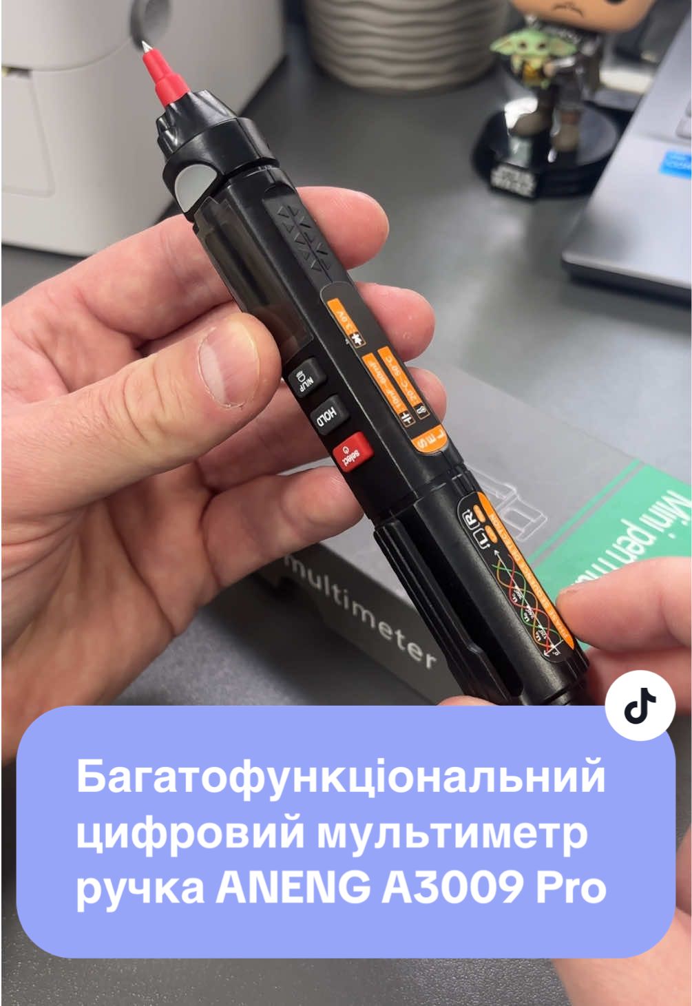 Багатофункціональний цифровий мультиметр ручка ANENG A3009 Pro на 6000 відліків з голосовою трансляцією ANENG A3009 Pro – це кишеньковий смарт-мультиметр із справжніми середньоквадратичними значеннями показань RMS та звуковим супроводом вимірювань. Він автоматично визначає та вимірює напругу постійного струму/напругу змінного струму/опір, без необхідності будь-яких перемикань, простий в експлуатації. Крім того, він має стабільну продуктивність, високу точність, оснащений автоматичним вимкненням після 5 хв. невикористання для економії енергії. Також прилад дозволяє вимірювати ємність та навколишню температуру, має функції діодного тесту та тесту на безперервність, безконтактного вимірювання напруги (NCV), вказівника нульової та фазної ліній, вимірювання послідовності фаз. Також пристрій оснащений захистом від перевантаження. Ідеальний інструмент для професійного, фабричного, шкільного чи домашнього використання. Особливості: - Універсальний мультиметр-ручка: цей мультиметр дозволяє вимірювати напруги/опір/ємності/температури, має діодний тест, тест безперервності, можливість виявлення нульової та фазної ліній та послідовності фаз. - Голосова трансляція в реальному часі: виміряні дані мультиметром транслюватимуться голосом англійською мовою (можливе відключення цієї функції). - Безконтактна індукція NCV: натисніть кнопку N/N/P, щоб вибрати режим індукції EF, коли поблизу буде виявлено напругу змінного струму, індикатор блиматиме червоним кольором та подаватиме звуковий сигнал. - Виявлення послідовності фаз: після того, як кінчик пера наблизиться до фазної лінії, тест ABC буде завершено і на дисплеї з'являться його результати. - Ідентифікація нульової та фазної ліній: натисніть кнопку N/N/P, виберіть режим LIVE, потім вставте ручку у гніздо, щоб визначити фазну чи нульову лінію. - Швидка реакція та висока точність: цифровий мультиметр ANENG A3009, 6000 відліків, має частоту дискретизації 3 рази на секунду та високу точність вимірювання. - Простота в експлуатації: він має кольоровий реверсивний РК-екран, який легко читає за будь-якої освітленості, ліхтарик для вимірювань у темряві, функцію зберігання даних, головний супровід англійською мовою. - Міцний матеріал і портативний розмір: вимірювальний прилад, виготовлений з якісних електронних компонентів і міцного пластикового корпусу, має малу вагу і легкий у перенесенні. - Набір змінних наконечників, які передбачені для різних видів тестування. - Широке застосування: цифровий мультиметр зручний інструмент та помічник, для тестування, діагностики та вирішення різних автомобільних та повсякденних побутових електричних завдань. Діапазон вимірювання та точність: - Напруга змінного струму: діапазон 0,8-1000 В, роздільна здатність 0,001-1 В, точність ± (1,2% +5d). - Напруга постійного струму: діапазон 0,8-700 В, роздільна здатність 0,001-1 В, точність ± (1,5% +8d). - Опір: діапазон 0,1–600 МОм, роздільна здатність 0,1 Ом–1 Ом, точність ±(3,5%+8d). - Ємність: діапазон 10 нФ-60 мФ, роздільна здатність 0,1 Ом-10 кОм, точність ±(1,5%+5d). - Температура: діапазон -20 ~ 50 ℃, точність ±(1.0% + 5)<50 ℃; діапазон 0 ~ 122 ℉, точність ±(0.75% + 5)<122 ℉. Характеристики: - Бренд: ANENG. - Модель: A3009 Pro. - Максимальний рахунок: 6000 відліків. - Матеріал: АБС-пластик. - Матеріал тестових ліній: латунь/ПВХ. - Основний колір: чорний. - Екран: кольоровий VA РК-дисплей. - Метод виміру: подвійне інтегральне перетворення A/D. - Час вибірки: близько 3 рази/секунду. - Індикація діапазону: «OL» відображається у найвищому положенні. - Автоматичне вимкнення: 5 хвилин без будь-яких операцій. - Живлення: 1*батарея 1,5 В типу ААА (НЕМАЄ В КОМПЛЕКТІ). У комплекті: мультиметр, тестовий щуп, позолочений тонкий щуп, нікельований мідний щуп, подовжений нікельований мідний щуп, конічний щуп, щуп з роз'ємом типу 
