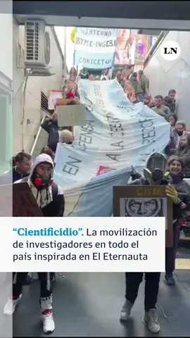 Con una serie de marchas en distintas ciudades del país y con epicentro en el Polo Científico del barrio porteño de Palermo, miles de investigadores –muchos de ellos, caracterizados como el personaje de Juan Salvo– se movilizaron en contra del “cientificidio”, la decisión del gobierno nacional de paralizar casi a cero toda la investigación científica del país.  Al igual que en la exitosa serie de Netflix, el lema fue “Nadie se salva solo”, a lo que se agregó la consigna “una nieve tóxica destruye la ciencia y la universidad”.