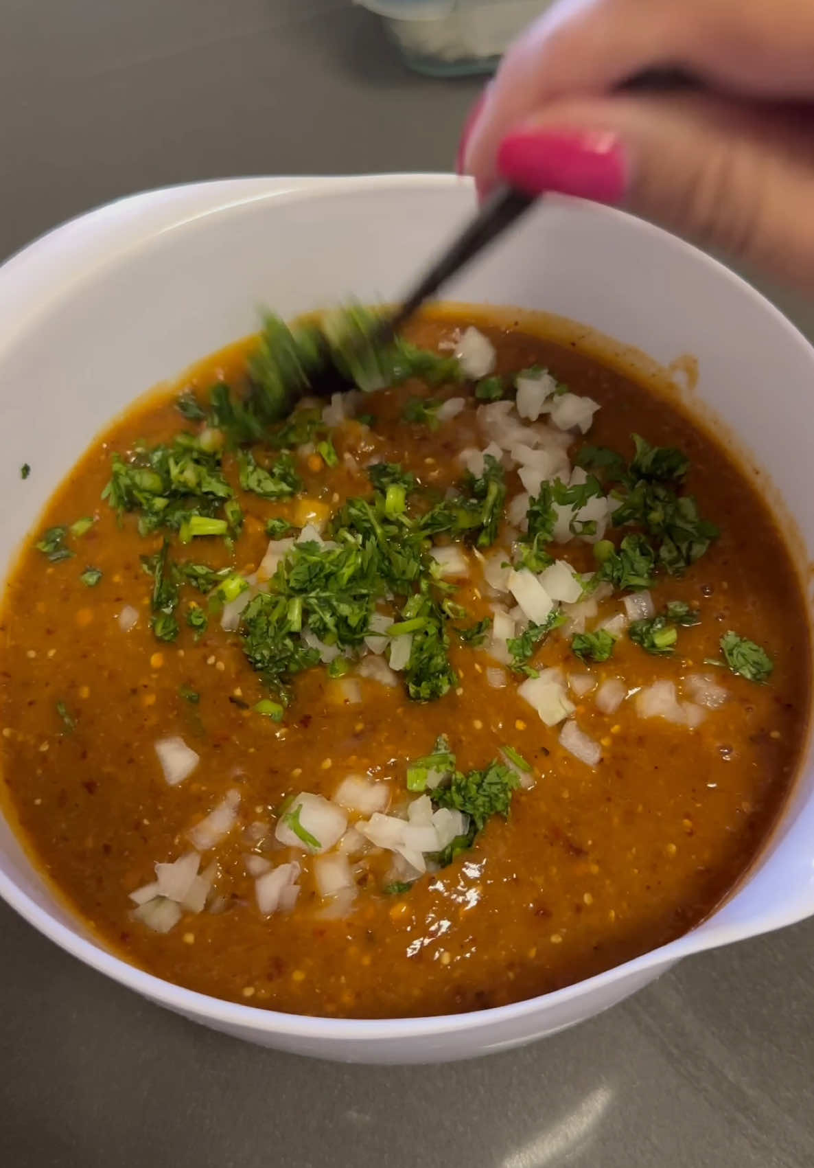 Salsa de Tomatillo y Chile de Árbol - Tomatillo Red Chile Salsa Una rica y picosa salsa the tomatillo. This tomatillo red chile salsa is extra spicy, smoky and perfect for tacos, tostadas, sopes and more. #salsadetomatillo #redsalsa #spicytomatillosalsa #chiledearbolsalsa #spicysalsa #salsapicosa #chiledetomatillo #mexicanfood #daisymayscookingandmore #food #Foodie #foodies #foodiesoftiktok #Recipe #recipes #cooking #tiktokfood #tiktokfoodie #tiktokfoodies #tiktokrecipes #tiktokcooking #Receta #recetas #recetascaseras #fyp  Ingredients/Recipe: -20 Tomatillos, husks removed and rinsed -30 Roasted Chiles de Árbol -1 White Onion -4 Cloves Garlic -1 Tbsp Ground New Mexico Chiles -1 Tsp Salt -1/4 White Onion diced -1/4 Cup Finely Chopped Cilantro Instructions: 1. To a large pot add tomatillos, onion and enough water to cover tomatillos. Bring to a boil over medium-high heat. Reduce heat to medium and cook tomatillos for 3 to 5 minutes. Do not overcook tomatillos or your salsa will taste bitter. 2. Roast Chiles de Árbol or buy chiles that are already roasted. 3. To a blender cup add tomatillos, onion, chiles de arbol, garlic, ground New Mexico chile, salt and blend until smooth. 4. Transfer salsa to a bowl and add diced onion, chopped cilantro and stir to combine. Hope you enjoy this recipe!!!👩‍🍳😋