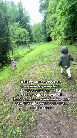 Modern playgrounds are clean, colorful, and safe—but they’re also predictable. Flat rubber surfaces. Metal steps. Straight ladders. It’s all curated for safety, but not necessarily for development. Our kids need more than that. They need to move on uneven terrain—across grass, gravel, dirt paths, sticks, roots, sand, hills. Why? Because nature doesn’t come with guardrails. Uneven ground forces constant micro-adjustments—ankles flex and adapt, core muscles fire, arms swing for balance, eyes scan and track changes. That’s where true coordination, body awareness, and balance are built. That’s vestibular input, proprioceptive feedback, postural control, visual-motor integration—all working together in real time. These wobbly, imperfect surfaces? They help build the kind of physical confidence and sensory integration a metal structure just can’t replicate. Let them wobble. Let them climb the uneven hill. Let them trip and try again. This is the good kind of hard. It’s how we wire their bodies for resilience, adaptability, and future fine motor skills #childhood #outdoorkids #1000hoursoutside #sensoryplay #sensoryplayideas #playground #childdevelopment #pediatricot #OT #occupationaltherapy #toddlersoftiktok 