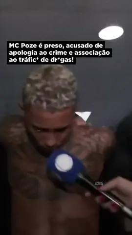 #McPoze acaba de ser preso acusado de fazer apologia ao crime e associação ao tráfic* de drogas‼️🚨 O artista foi preso na manhã desta quinta-feira (29) por agentes da Delegacia de Repressão a Entorpecentes (DRE), no Rio de Janeiro. A polícia afirma que ele teria ligação com o tráfic* e acusa o funkeiro de fazer apologia ao crim* em suas letras e shows. De acordo com a investigação, Poze se apresenta em bailes em favelas dominadas por uma facção, com presença de trafic*ntes armados e um desses shows teria acontecido no mesmo dia que um policial foi m*rto. Vídeos que circularam nas redes nos últimos dias foram usados como base para o mandado.🗣️