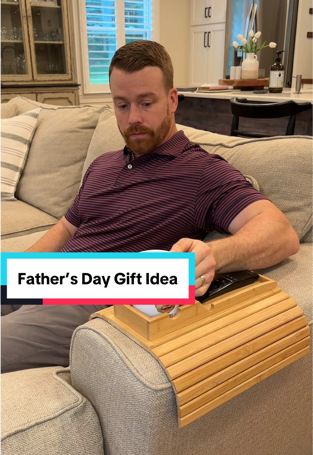Foldable bamboo tray with cup holder. Perfect for drink, snack & remote. Fits any size arm rest! Currently 50% off! #homehacks #tray #FathersDay  #fathersdaygift #organization 