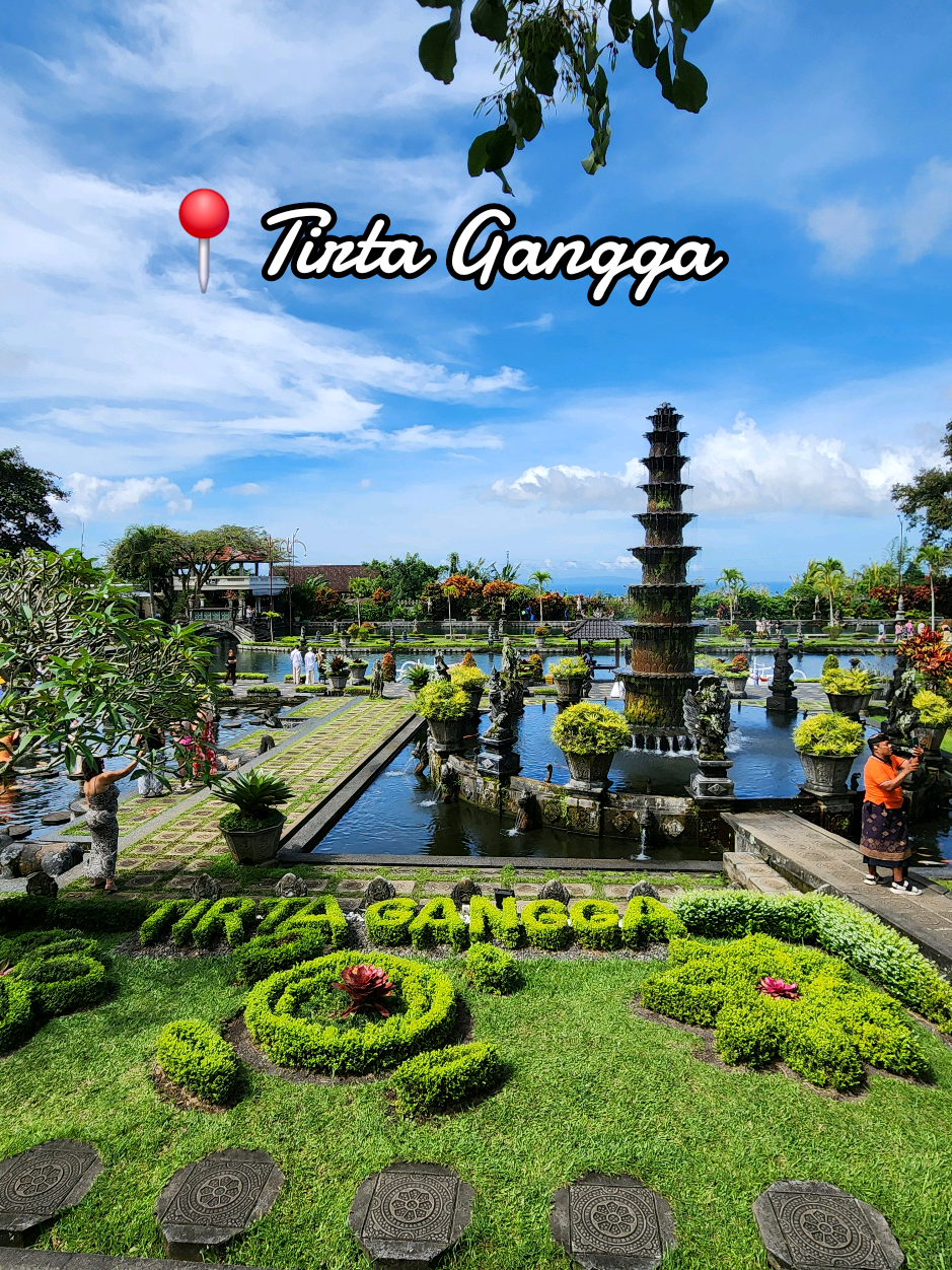This beautiful temple is located in Amlapura. It was once a royal palace, which was nearly destroyed by volcanic eruption in 1963. I recommend visiting Titra Gangga for it's enchanting views and Instagram worthy photos, but try to come in the morning as it does get busy later on in the day.  . #bestofbali #amlapura #bali #indonesia #travel  #traveltiktok #balitravel #destinations #balitour #fyp 