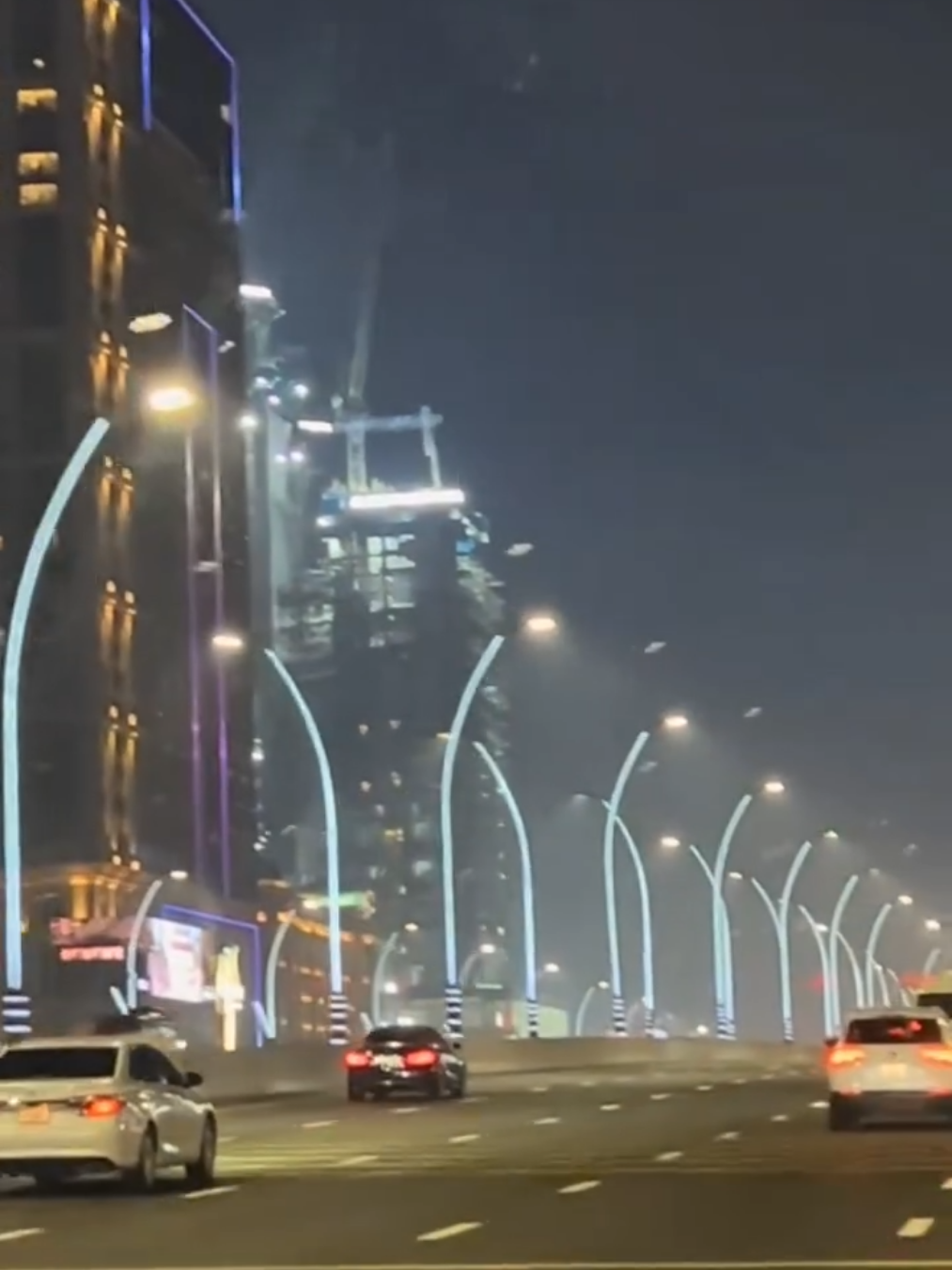 Skyscrapers, sparkles, and endless vibes 🔥 #tiktok #dubai #uae #colourfulnight #nightdrive #nightvibes #sheikhzayedroad 