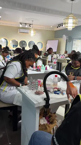 💅 Future nail techs in action! Our students are mastering the art of flawless nails, one stroke at a time. #NailTraining #BeautySchoolJourney