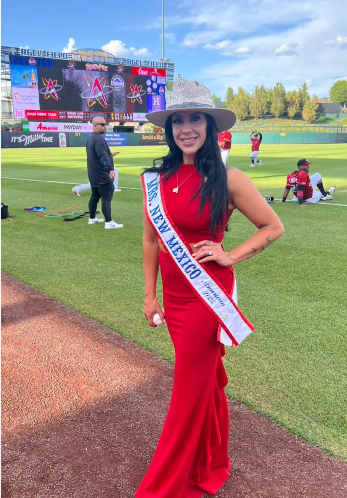 As Mrs. New Mexico American, I had the incredible honor of throwing the first pitch (former college softball player) at the Isotopes game vs. the Cowboys tonight! ⚾️ #newmexico  From fashion shoot to the pitcher’s mound, I’m beyond grateful for every wild, beautiful twist this journey brings. Thank you @abqtopes for the unforgettable night and the chance to bring some sparkle to the stadium! 💫💃🏽 #MrsNewMexicoAmerican #Pitch #Heat #IsotopesBaseball #AIandMe #QueenOnAndOffTheField #GratefulHeart #MamaBossMoments #MrsNewMexico #MrsAmerican #MrsWorld #BeautifulNight  Videographer: @kevijo  photographer: @g_reach