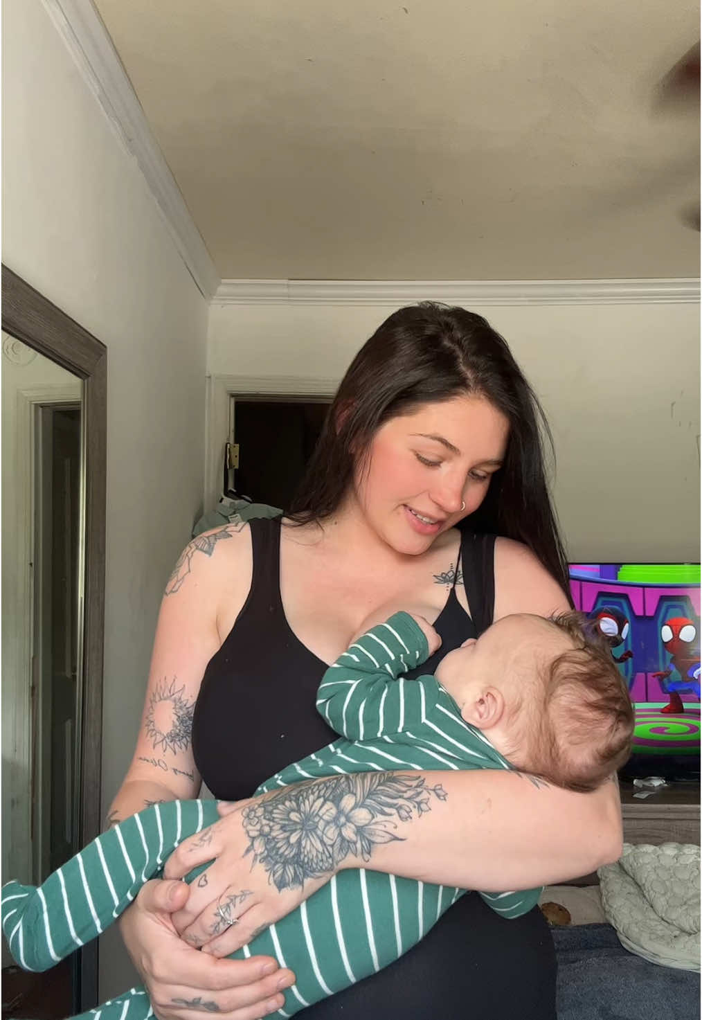 Guyssss I can’t get over how PERFECTTTT this shirt is.  All for reference, I’m large chested, DD, and wearing a large. I also am not wearing a bra underneath at all and it holds very well that I can even use it as a bra! #nursingshirts #breastfeedingjourney #MomsofTikTok #womanempowerment #momvlog #breastfeedingbras 