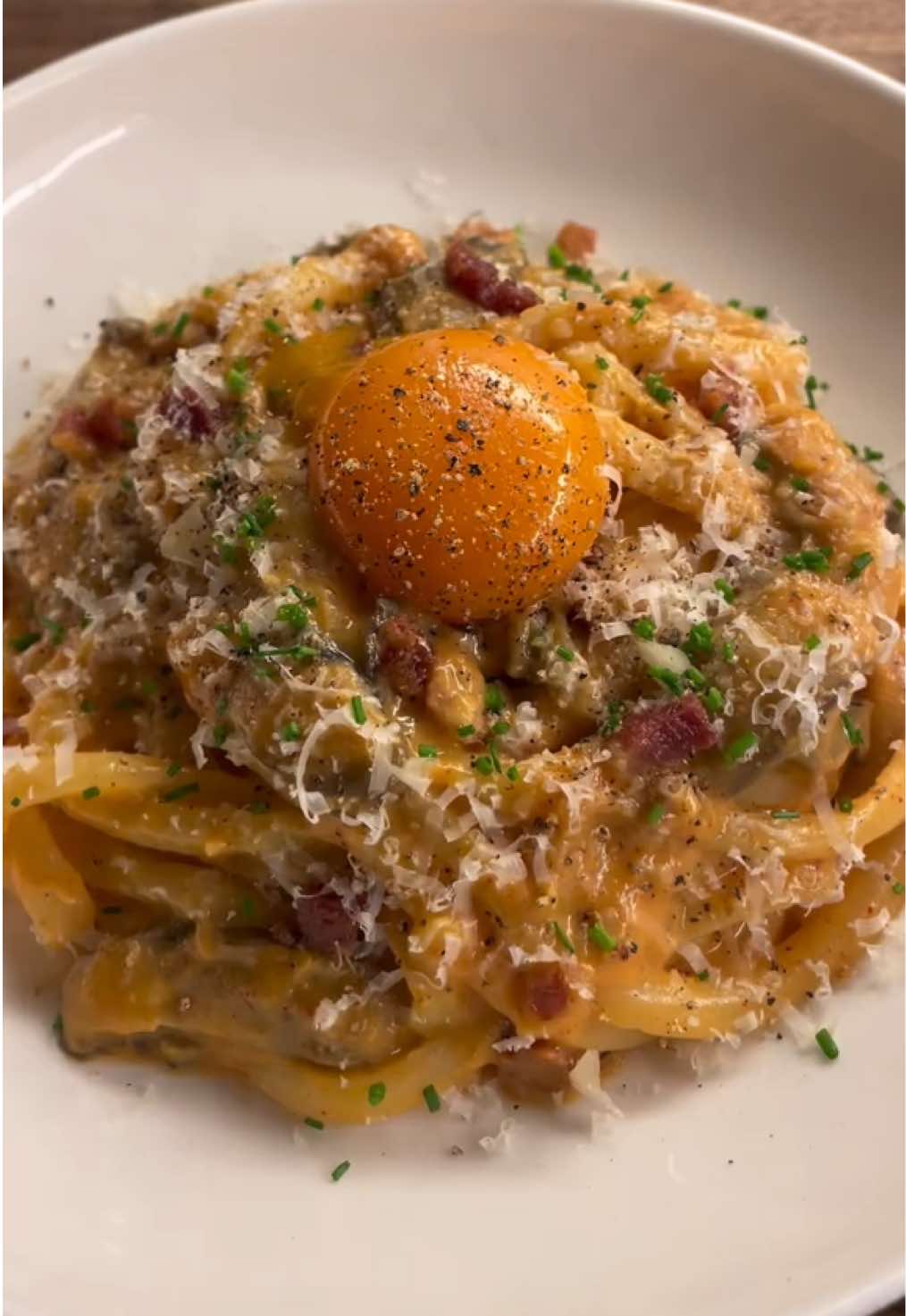 spicy miso carbonara udon🌶️ INGREDIENTS:  - 1 shallot  - 5-6 garlic cloves  - 3 shiitake mushrooms - 6-8oz pancetta (guanciale or bacon)  - 3 blocks of udon noodles - 1 egg  - 3 egg yolks  - 3 tbsp miso paste  - 3 tbsp gochujang  - 3/4 cup grated parmesan - 1/2 tsp black pepper  - 1/2 cup udon water  - 1 tbsp butter *chives, egg yolk, more parm, & pepper for garnish  inspired by ini ristorante  #asmr #spicymisocarbonara #miso #spicymiso#carbonara #udon #pasta #Summer #EasyRecipes #cooking #dinner #spicy #food #noodles #comfort #simplemeals 