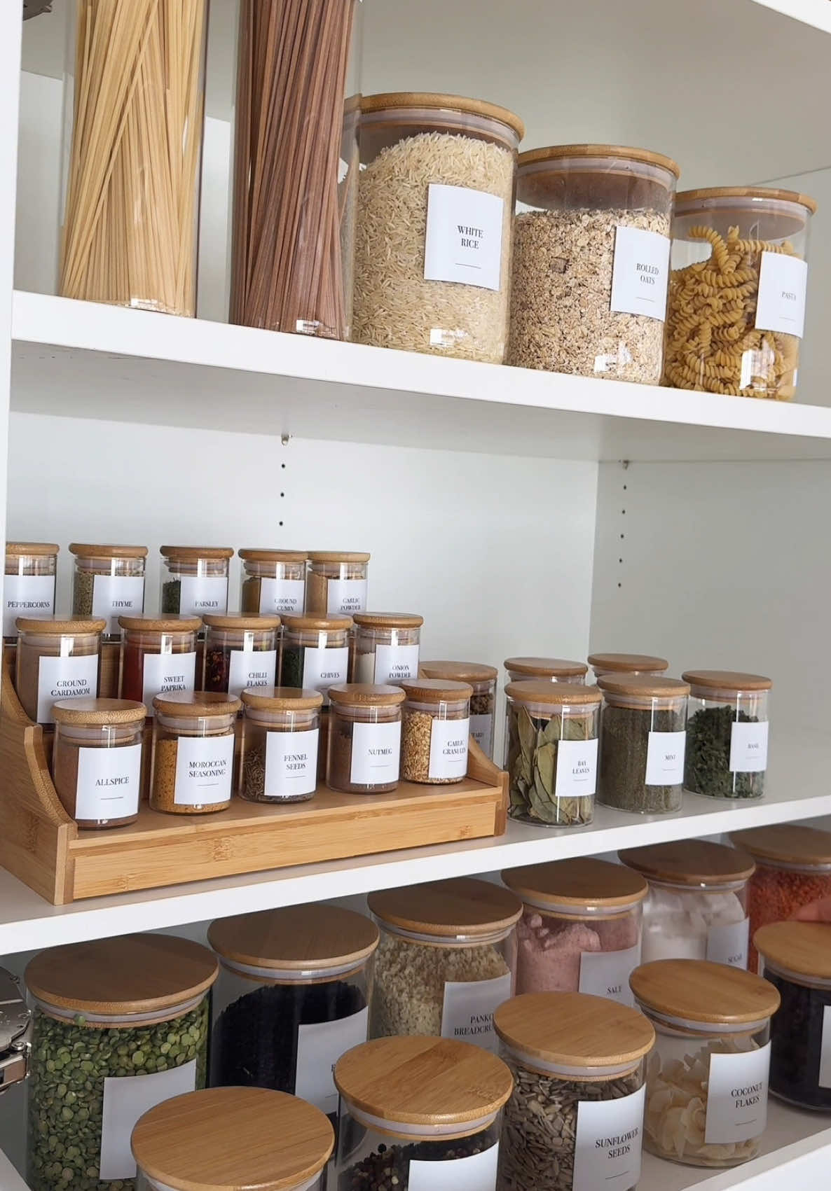 If you don't know where to start with your pantry. Start here ✨ With our Bamboo Glass Deluxe Pantry Container Pack and our SLEEK labels!   #homeorganisation #bambooglassjars #pantryreset #organisedhome #organisationtips #pantrygoals #storagesolutions #pantrylabels #spicesorganisation 