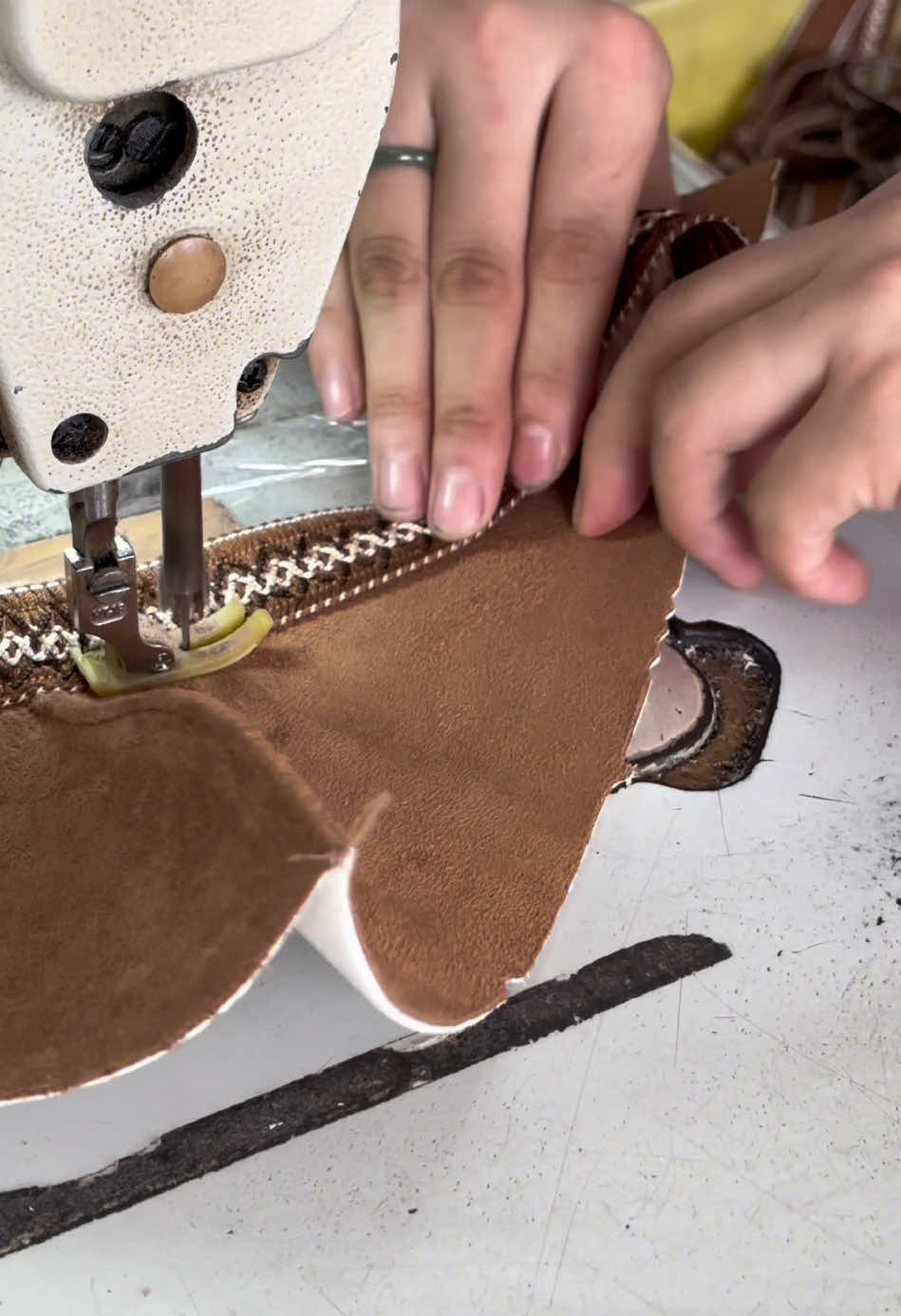 Sew winter shoes’ upper. 50 Years of Expert Shoemaking. Trusted Quality,Reliable partner! OEM&ODM customization avaliable with stable bulk supply!#DoMoreInAYear #b2b #footwear #shoemanufacturer #shoesfactory #flipflops #productionline #slippers #wintershoes #sandal #slides #fashionshoes #ugg #wholesale ##sewing 