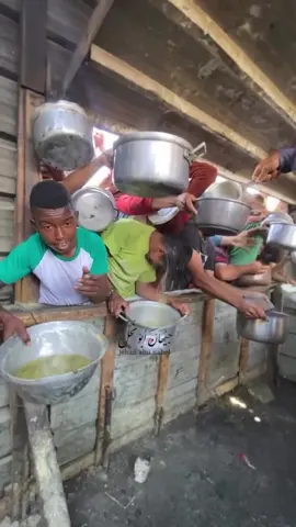 6-2-2025 The Children of Gaza are Starving  Children's cries weren't just from hunger... In a painful scramble for a meal at a charity kitchen in Gaza, hot food spilled onto a child, leaving him with burns. Survivors of the Israeli bombing are still facing fire but this time, in food lines. #FreePalestine #Gazaholocaust #gazaforcedfamine 