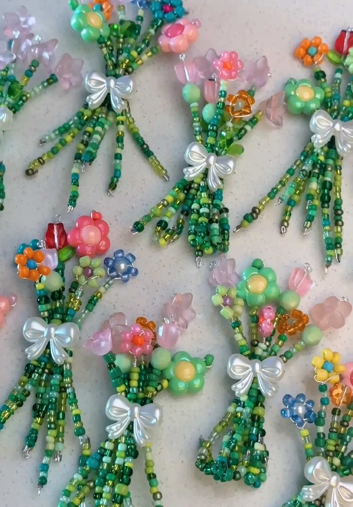 Replying to @olusia l ✨beaded flower bouquet magnets!✨ #zenspiredesigns #SmallBusiness #plantparty #newcraft #beadedflower #beadedflowerbouquet #flowerbouquet #satisfyingvideo #oddlysatisfying #beadorganizing