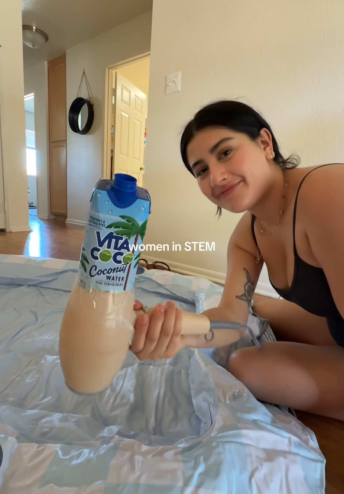Taking notes (if anyone tries this, please don’t use the hot setting 👍) @Gloria #vitacoco #coconutwater #womeninstem #innovation #inflatablepool #blowuppool #foryoupage #fyp 