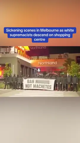 'This is disgusting behaviour by a group of cowards who seek to do nothing more than intimidate and spread hatred – we will not stand for it', Victorian Premier Jacinta Allan told Guardian Australia.  Police are investigating after the group gathered outside Northland Shopping Centre in Preston, north-east of Melbourne's CBD about 3.30am on Sunday.  They were filmed dressed in black with their faces covered while chanting slogans such as 'white man, fight back' and 'white pride' while holding an offensive banner. It came a week after a violent brawl broke out between 'rival gangs' armed with machetes at the shopping centre on the afternoon of May 25.  That incident prompted the Victorian government to fast-track its ban on the sale of machetes to immediately take effect instead of September.  #melbourne #shocking #sickening #dailymail #australia #fyp #terrible #auspol #crime #crimetoks 