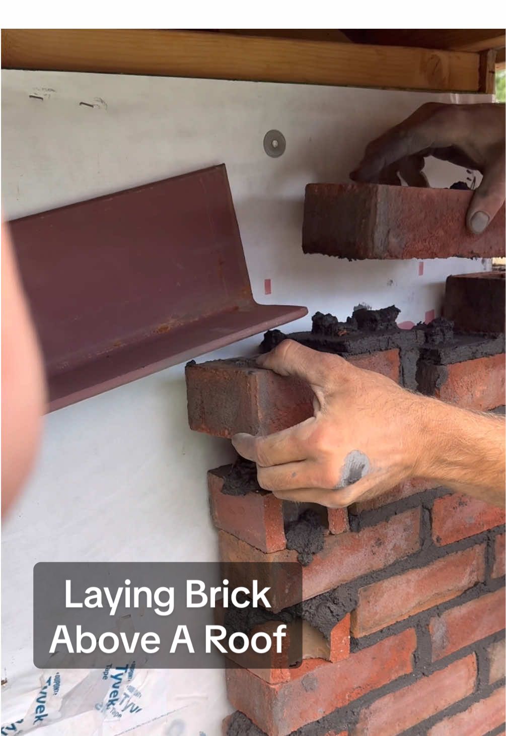 We built a ledger and installed an angle iron to support brick above a roof #build #howto #construction #DIY #contractor