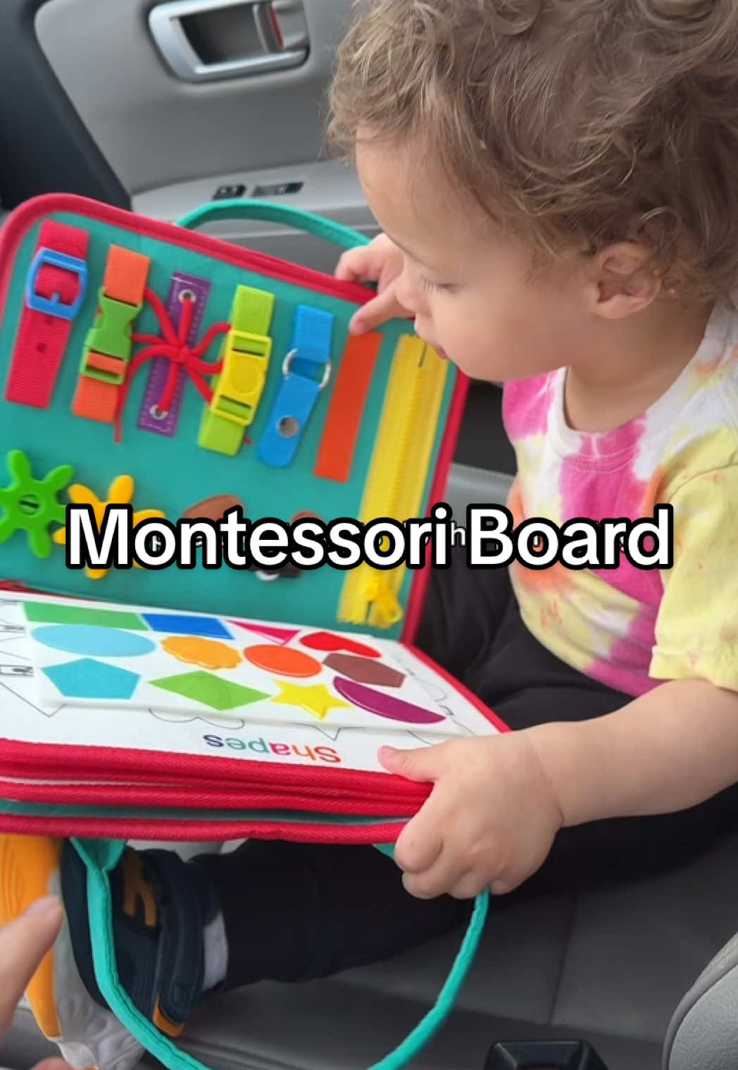 This busy board is so educational and keeps him entertained!! #montessoritoys #busyboard #montessoriboard #busyboardforbaby #educationaltoy #earlyeducation #preschoolactivities #finemotorskills #toddlerentertainment #creatorsearchinsights 