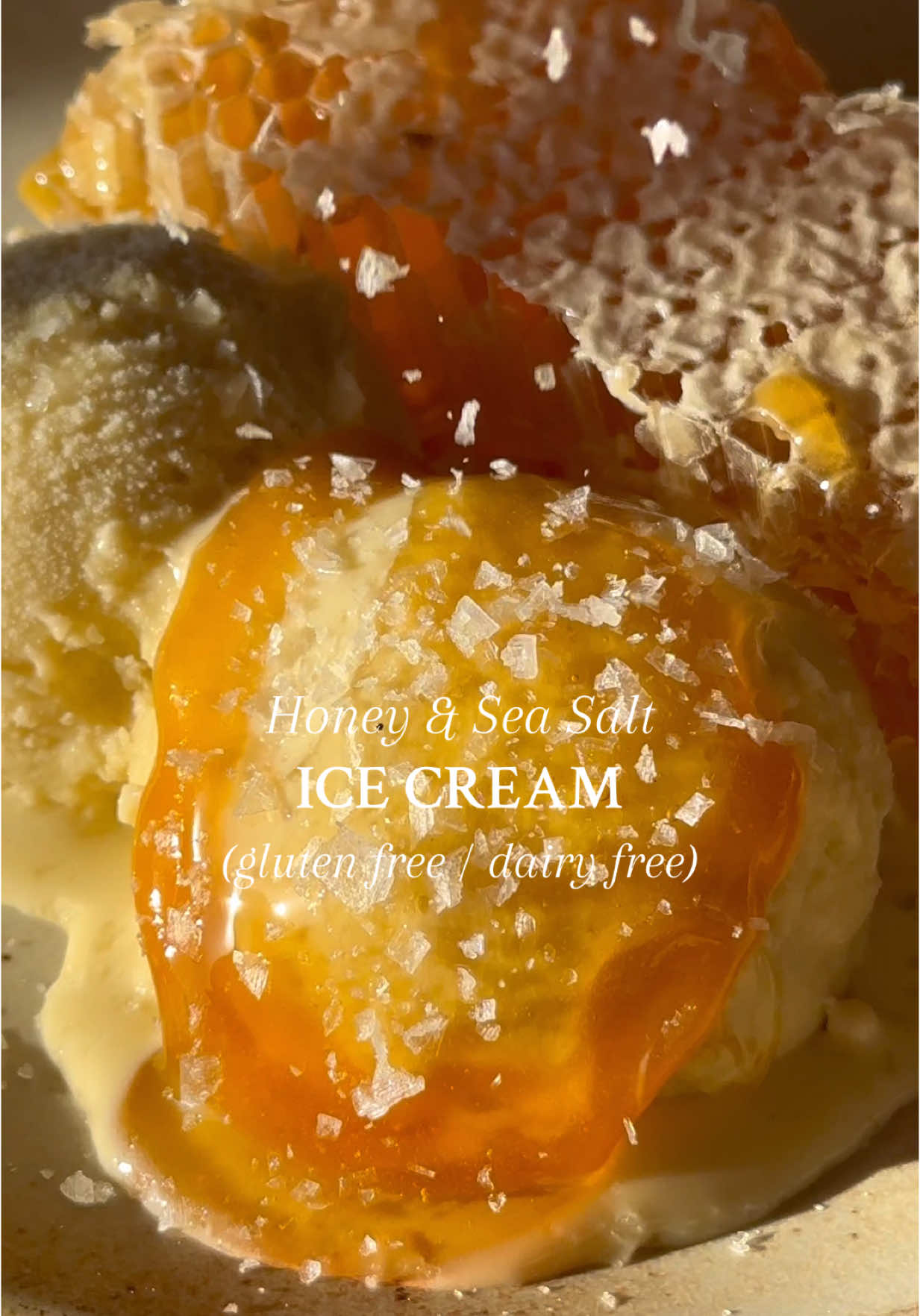 HONEY & SEA SALT ICE CREAM (GF / DF) ✨ My first ever viral recipe and quite possibly the one I’m most proud of to date. This dairy free coconut based ice cream uses egg yolk just like a standard custard ice cream and is just as rich, creamy and smooth as any traditional recipe without the dairy. It’s the base of all of my ice cream flavors, making it incredibly versatile, but also truly perfect all on its own. Save and follow @caitlinjesson for easy gluten free and dairy free recipes.  13.5 oz can coconut milk 10.8 oz (qty (2) 5.4 oz cans) coconut cream 1 tbsp vanilla extract 5 egg yolks ¼ cup sugar (optional) 1 tsp salt ½ -¾ cup honey To make ice cream base, add egg yolks, vanilla extract, sugar (if using) and salt to a medium sized bowl and whisk continuously until eggs begin to turn a pale yellow.  Heat coconut cream and coconut milk in a small sauce pan over medium low heat until just warm. Remove from heat and slowly add half of the cream mixture into your eggs while whisking.  Transfer the egg mixture back into your sauce pan with the remaining cream over low heat.  Allow cream mixture to just start to come to a simmer, stirring constantly to prevent scorching, then turn off heat as soon as you see the first bubble form. Stir in ½ cup honey if using sugar or ¾ cup honey if not using sugar, then cool and transfer to Creami container.  Freeze for 24 hours and follow instructions on Creami to mix into ice cream. Enjoy as is or top with more honey and flaky sea salt.  #food #Foodie #dairyfree #glutenfree #cooking #Recipe #healthyfood #healthyeating #healthyrecipes #EasyRecipes #dessert #fypage #fypシ゚viral 