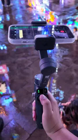 Spinning through rain like it's a vibe 🌆With Osmo Mobile 7P’s seamless rotation, every street light and puddle tells a story. 🎬Go hands-on with your next scene. #djiosmo #osmomobile7p #phonegimbal #vloggear #fyp