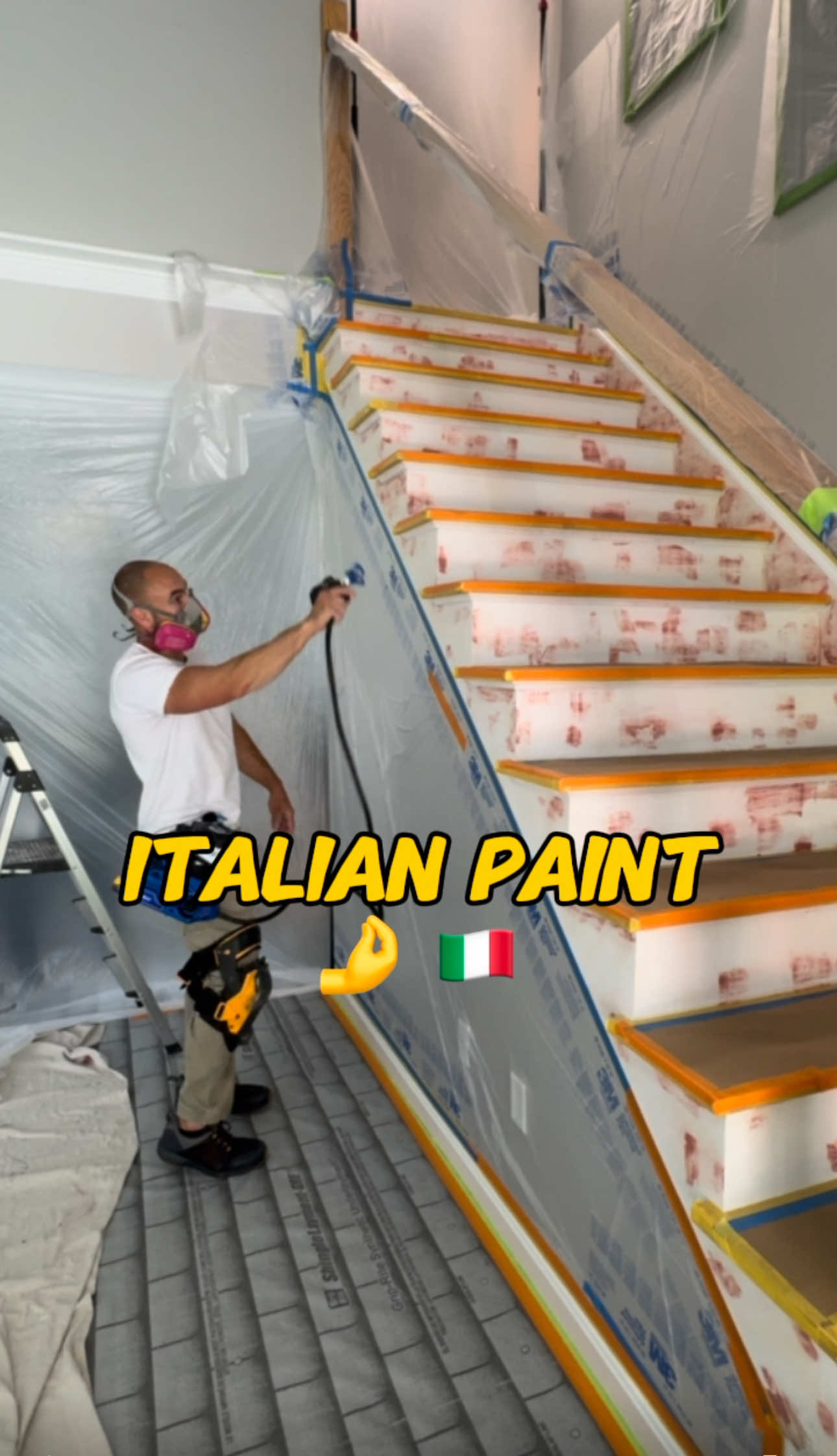 Spraying Italian paint for the perfect finish. #DIY #construction #carpentry #remodeling 