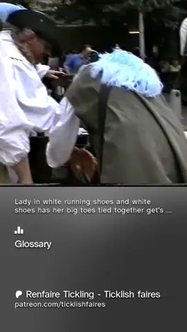 Lady in white running shoes and socks get's put into the stocks at the renfaire and tickled