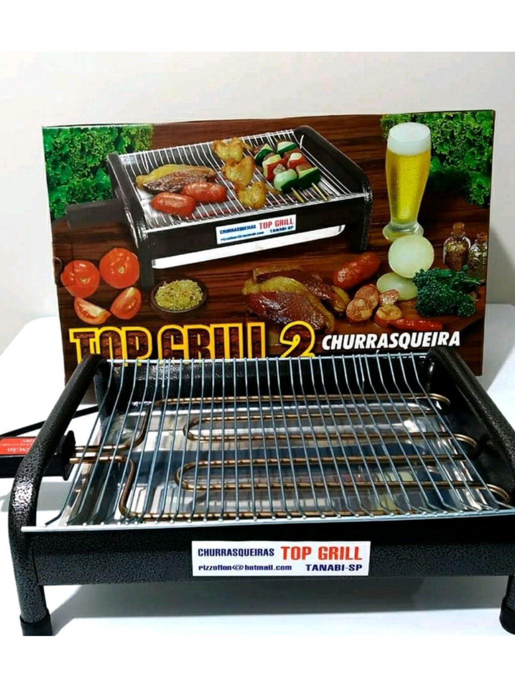 🔥 CHURRASQUEIRA ELÉTRICA TOP GRILL 2 🔥 Sabor de Churrasco com Praticidade e Segurança! 🍖 Ideal para apartamentos, varandas e pequenos espaços ⚡ Funciona na tomada – sem fumaça excessiva 🥩 Assa carnes, legumes e espetinhos com rapidez 🧼 Fácil de limpar e transportar 💪 Estrutura resistente e durável 📦 Acompanha manual e embalagem original 📍 Fabricada em Tanabi - SP 📧 Suporte direto com o fabricante: pizzonflon@hotmail.com 👉 Perfeita para churrascos em qualquer ocasião! Garanta já a sua e leve o sabor da churrasqueira para dentro de casa! 📲 Entre em contato para mais informações ou para fazer seu pedido!