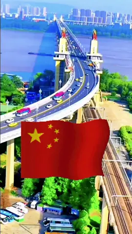 This is the Nanjing Yangtze River Bridge in China 🇨🇳. It is the first double-deck road-rail bridge designed and built by China on the Yangtze River. The upper layer is a highway bridge, and the lower layer is a railway bridge. Completed and opened to traffic in 1968, it is an iconic landmark of Nanjing and even China, holding great significance in the history of Chinese and world bridge engineering. 这是南京长江大桥，它是长江上第一座由中国自行设计和建造的双层式公铁两用桥，上层为公路桥，下层为铁路桥，于1968年建成通车，是南京乃至全中国的标志性建筑，在中国桥梁史和世界桥梁史上具有重要意义。#china🇨🇳 #China #discoverchina #带你看中国 #asian #sceneryvideos #travelling #scenery #sceneryvideo #bridges #travel #nanjing 
