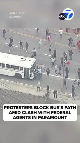 During a chaotic confrontation with immigration agents in Paramount, protesters tried to block the path of a slow-moving bus apparently operated by the U.S. Marshals Service.