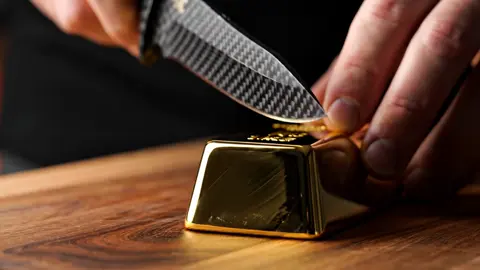 Casually slicing a gold bar #asmr #satisfying #oddlysatisfying #creatorsearchinsights 