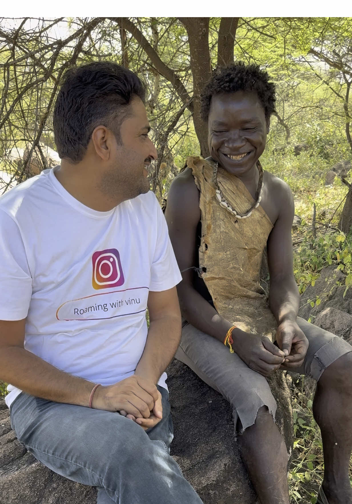 Can you guess what Dudukwe is munching on? 👀 Drop your guesses in comments ! 🎥 Full vlog coming soon on YouTube! Follow for more tribal food stories 🌍✨ #Hadzabe #TribalFood #AfricanCulture #Bushlife #TraditionalFood #WhatIsHeEating #WildFood #RoamingWithVinu #CulturalStories #tiktoktravel #TribalLiving #snack #snacks #FoodTok #foodies #FoodLover #yum 