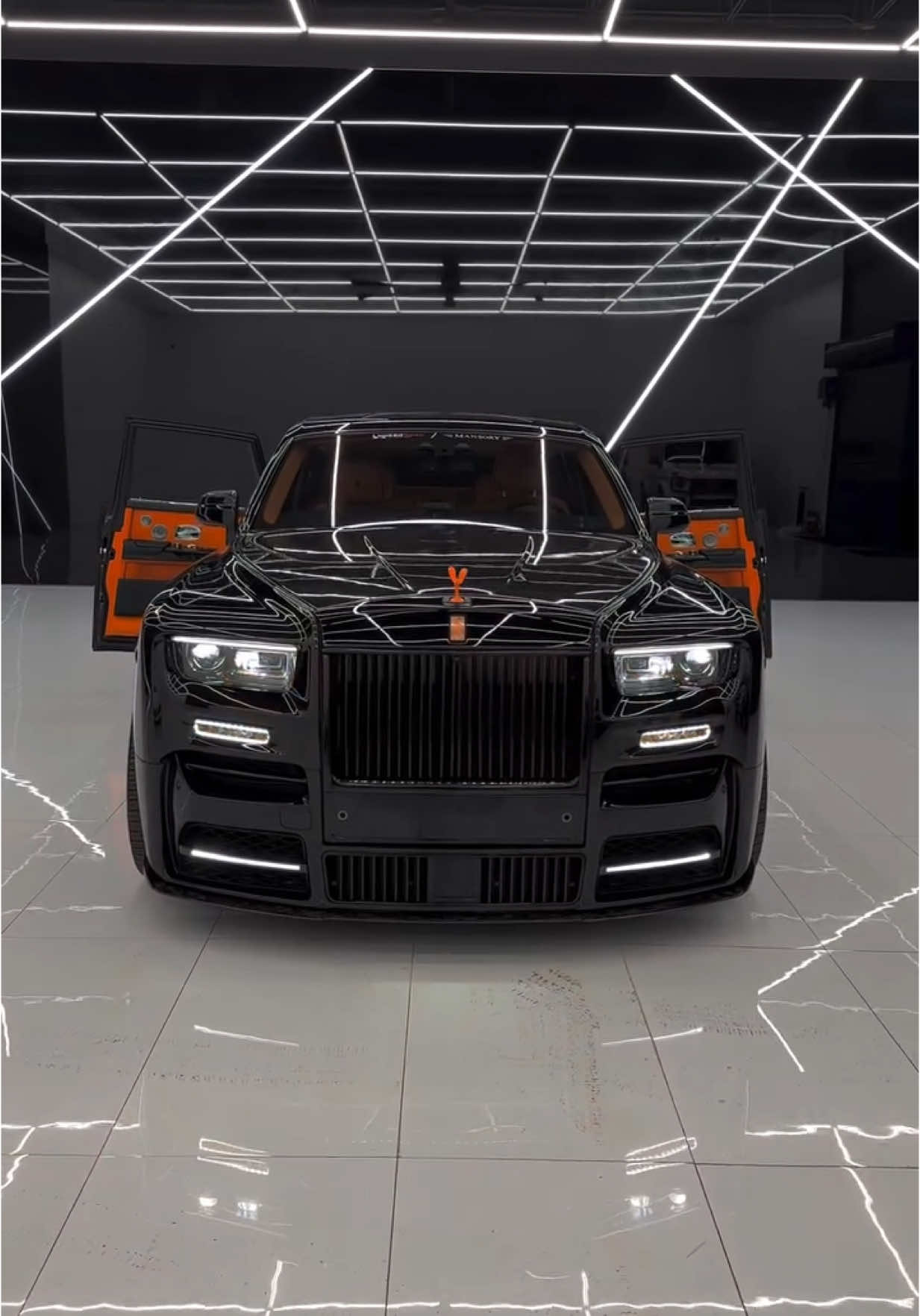 2024 Rolls-Royce Phantom × MANSORY Edition Black Exterior 🖤 | Mandarin Orange Interior 🧡 $649,000 💰 | 7,000 Miles 🧭 Unapologetically Bold. Unmistakably Bespoke. ⸻ Highlights & Specs: • 🧱 Full Mansory Widebody Kit – ultra-rare customization • 🛞 Paint-Matched Mansory Wheels – stealth elegance • 🟧 Mandarin Orange Interior – rich, striking, and tailored • ➖ Mansory Stripe in Mandarin Orange – subtle aggression • 🛋 Hand-Crafted Cabin Detailing – Phantom-level refinement • 🎥 Rear Privacy Features + Starlight Headliner (if spec’d) • 🖥 Rolls-Royce Tech Suite | Rear Coach Doors This Phantom doesn’t whisper luxury — it commands it. Built for the spotlight, but made for the few. ⸻ Price: $649,000 Mileage: 7,000 miles ⸻ 🔻 Hashtags for TikTok & IG: #RollsRoycePhantom #MansoryEdition #BlackOnMandarin #LuxurySedan #PhantomPresence #UltraLuxury #OneOfOneBuild #MansoryLife #RollsRoyceNation #RareSpec #BespokeExcellence #CarTok #LuxuryCollectors #RollsRoyceGang #exoticreels 