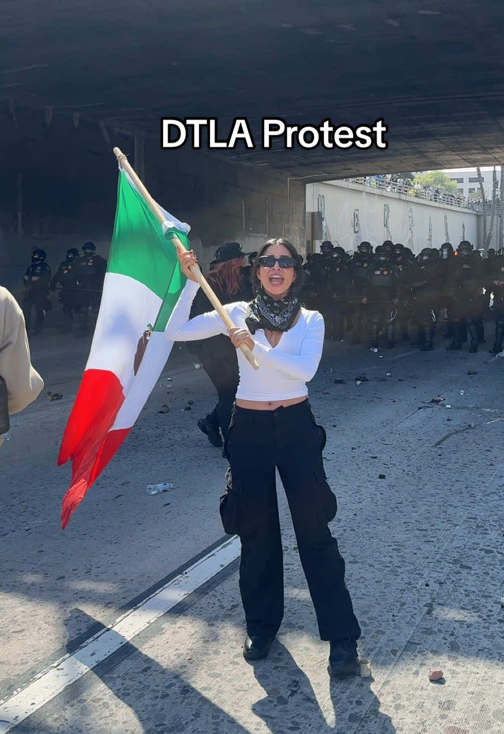 I hold the Mexican flag with pride—because I’m Mexican-American, and I’m proud of my culture and my people. The same people Trump calls criminals and “illegals” are the ones keeping this country running. We’re not aliens—we’re farmworkers, nurses, builders, small business owners. We’re the backbone of this country. They want us to be ashamed of who we are—to believe the lies, to stay quiet, to disappear. That shame is how they win. It’s how they got some of our own to vote for the same system that targets us. But I won’t be silent. I won’t be ashamed. Not ever again. I wave my flag high because I am proud. Proud to be Mexican. Proud to be from a people who survive, who resist, who rise. This isn’t the America they told us it was. Because when a racist dictatorship detains our people for profit and calls it law, that’s not freedom. That’s oppression. Trump didn’t protect the American flag—he tarnished it. But he won’t take mine. 🇲🇽✊🏽