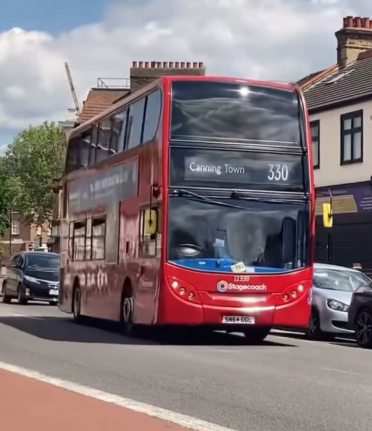 Rare Working throwback. 12338 (SN64 OGL) can be seen making a very rare working on the Route 330 for Canning Town. Taken back in 2021. #fyp #viral #xyzcba #londonbus #buses #bus #london #2025 #throwback 