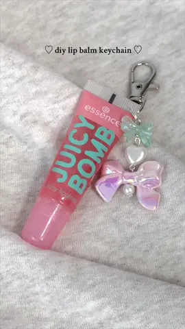diy lip gloss keychain 💋 💄 @essence.cosmetics lip balm  💄 beads from @Michaels Stores  (yes I know the nails are AWFUL - long story short I will no longer be using builder gel 💀)  #lipgloss #lipglosskeychain #diykeychain #bagcharms 