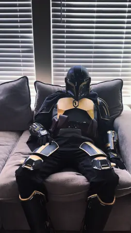 Not all armor is for war. #mandalorian #starwarscosplay #cosplayvibes #masculineenergy #slowburn #fyp #tiktokmen #helmeton #softmasc #darkvibes