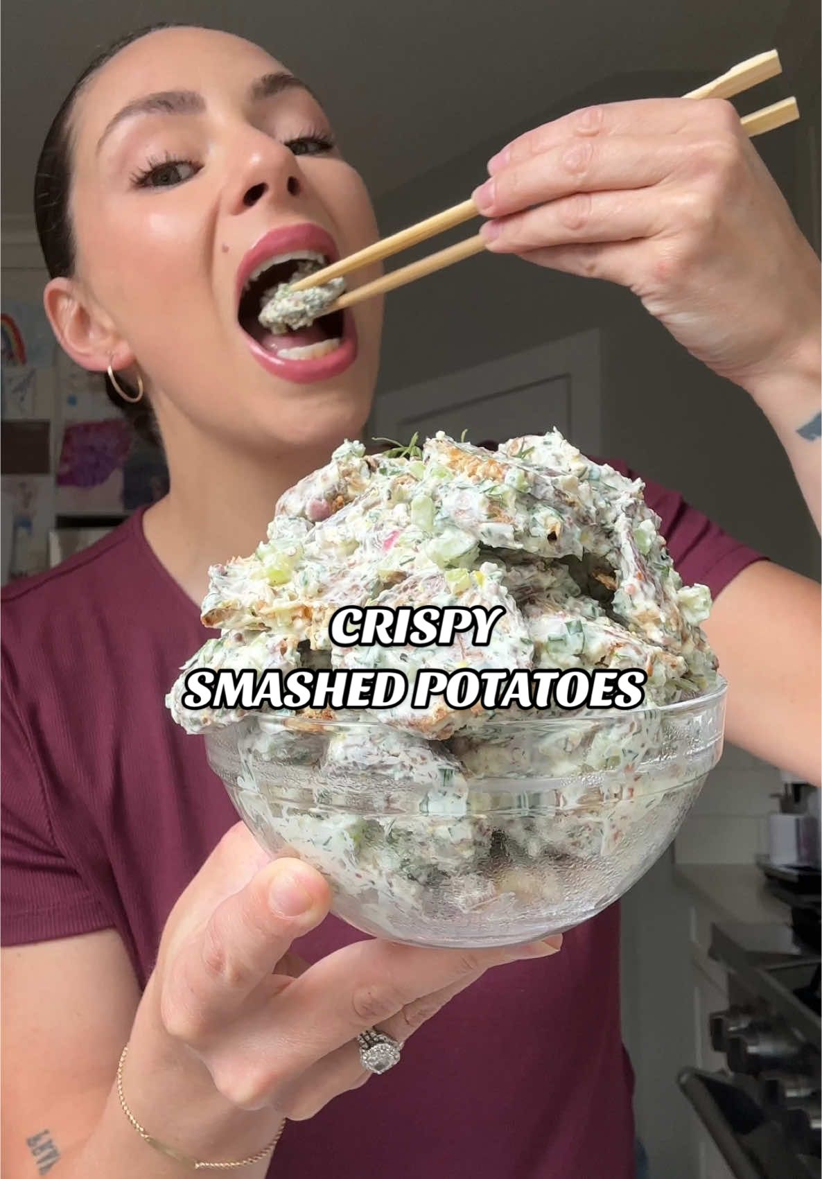 Crispy Smashed Potatoes with Lemon Dill & Chive Dressing 🥔 the only way I’m eating my potatoes this summer 👀 RECIPE BELOW⬇️ Ingredients 2-2½ lbs baby potatoes whole 1 tbsp olive oil 1/2 tsp salt to the boiling water Dressing: 1¼ cup sour cream or plain greek yogurt  1 tbsp grainy mustard 1 tsp honey 2 tbsp lemon juice freshly squeezed 1½ tbsp lemon zest 2 garlic cloves chopped fine 1 shallot chopped fine 2 celery sticks chopped fine 3 tbsp fresh chives chopped fine 1/4 cup fresh dill chopped fine 1/2 tsp salt 1/4 tsp black pepper 1/4 tsp garlic powder Instructions Prepare the potatoes: wash the potatoes and pat to dry. Blanch the potatoes: bring a large pot of water to boil and add your potatoes, and 1 tsp of salt. Cook for 15-20 minutes, or until fork tender. Drain and let air dry for 5-10 minutes (the drier the potato the crispier they'll be). In the meantime preheat your oven: to 425 °F. Mix: to a large mixing bowl, add the blanched potatoes, 1 tbsp of olive oil and season to taste with salt and pepper. Smash: add the potatoes to a large lined baking sheet and spread out evenly. Press each potato firmly with the flat side of a fork or bottom of a small glass until the skin breaks and the potato flattens. Don't worry about making them look pretty, they'll be delicious regardless. Bake: for 35-45 minutes or until crispy (this will depend on the size of your potatoes). Once cooked, allow the potatoes to rest on the baking sheet for 5 minutes to slightly cool and crisp up even more. Prepare the dressing: to a large mixing bowl whisk together the sour cream, grainy mustard, honey and lemon juice. Next, add the lemon zest, garlic, shallot, celery, chives, dill, salt, pepper and garlic powder. Toss: add the crispy potatoes directly to the dressing and toss to combine until all of the potatoes have been fully covered. Garnish: with more fresh dill, lemon zest and black pepper. #potatoes #smashedpotatoes #sidedishes #crispypotatoes 