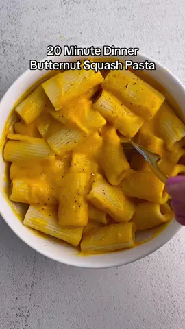 Next up in our 20 minutes dinner series, this butternut squash pasta is rich and creamy but completely plant based! The trick is using frozen butternut squash so this recipe comes together in just a few minutes.  8 oz rigatoni (or other short pasta) 1 cup pasta water, reserved 1 lb frozen cubed butternut squash (See note if using fresh butternut squash) 1/2 cup almond milk (or other neutral non-dairy milk) 2 tablespoons olive oil 1/2 cup nutritional yeast 1 teaspoon onion powder 3/4 teaspoon garlic powder 1 teaspoon smoked paprika 1 teaspoon salt 1/2 teaspoon ground black pepper Instructions Cook the pasta according to package directions, reserving 1 cup of pasta water before draining the pasta. Steam the squash according to the package directions until the squash is very soft. Transfer to a blender and add the olive oil, onion powder, garlic powder, smoked paprika, almond milk, nutritional yeast, salt and pepper. Add the reserved pasta water, starting with 1/2 cup of water, and blend. For a thinner sauce, continue to add pasta water until you reach your desired consistency. Toss with the pasta and serve immediately. For extra cheesy flavor sprinkle additional nutritional yeast on top.