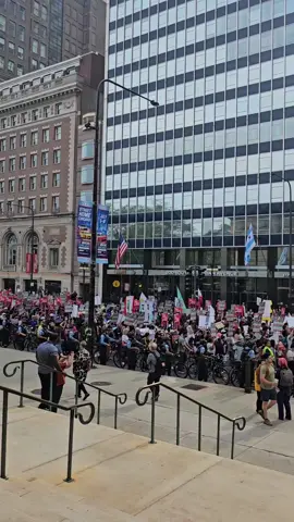 In front of the Art Institute of Chicago today around 5pm. Police moving in bicycles with protestors.
