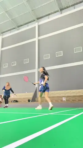 🏸