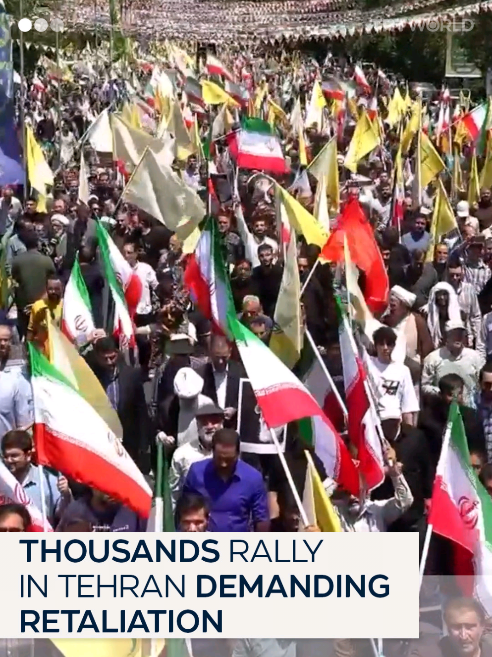 Thousands of Iranians rallied in Tehran on June 13, condemning Israel's airstrikes on military and nuclear sites near the capital. Protesters chanted anti-Israel slogans and demanded a strong response from the Iranian government.  #tehran #israeliranconflict 