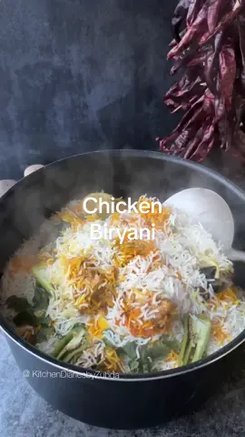 Quick and Easy Chicken Biryani! Friday calls for biryani and this is my most easiest way to make biryani when i don't have much time on my hands. For Chicken; Chicken with bones 2kgs Blend these things together; Full Fat Greek Yogurt 1 cup Salt 2 tosp Kashmiri Chilli Powder 2 tosp Chilli Flakes 1 tosp Coriander Powder 2 tosp Cumin Powder 2 tbsp Turmeric 1/2 tosp Homemade Biryani Masala 2 tbsp (recipe on my feed) Garlic Cloves 6-7 Ginger Root 3 inches Green Chillies 2 Fried Onions 1 Cup Mint 1/2 Cup Coriander Chopped 1/2 cup Oil: 1/2 cup Hira Heat up oil. Add chicken. Cook until colour changes. Add the mixture and cook until oil separates and chicken is tender. For rice Rice (washed and Soaked) 1.5kg Salt to taste 1 tosp Cumin Seeds 1 tosp Star Anise 3-4 pcs Bay Leaves 3-4 pcs Lemon Slices 6-7 Green Chillies 2-3 Boil until 80% done For garnish; Lemon Slices 6-7 Green Chillies 6-7 Chopped Mint and Coriander Yellow food color Put on dum for 25 minutes on medium heat. #easyrecipesathome  #easycooking   #EasyRecipes  #biryani #chickenbiryani 