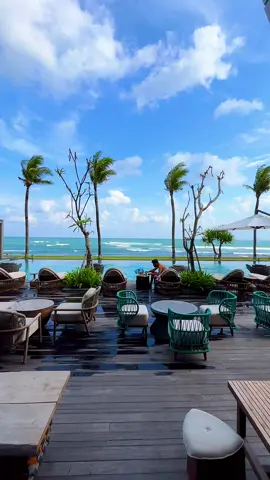 Cozying up at the beach club on a rainy day 🌧️ —— 📍Beach House at Regent Bali Canggu
