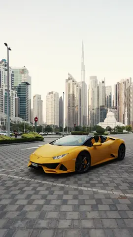 💛 Yellow Huracán Owning Dubai Streets | Flashy, Fast, Unmissable Bright yellow Lamborghini Huracán slicing through Dubai’s cityscape — loud engine, louder presence. When you drive this, you’re not just on the road… you’re in the spotlight. ⚡️ V10 fury. Street style on max. Dubai just became your runway. #dubai #luxury #lamborghini 