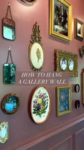 Here is how I hung my gallery wall for my hallway makeover! Color is reddened earth by HGTV home by SW