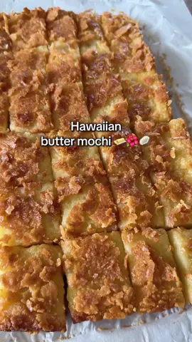 Hawaiian butter mochi recipe:  🧈🌺🥥 1 bag (16 oz) glutinous rice flour  2 cups granulated sugar 1 tsp baking powder  1 can coconut milk  2 cups whole milk 4 eggs 2 tsp vanilla extract  1 stick (1/2 cup) melted butter  Shredded coconut for topping (optional)  1. Preheat oven to 350° F  2. In a medium bowl, whisk together the glutinous rice flour, sugar, and baking powder  3. In a large bowl, add the coconut milk, whole milk, 4 eggs and vanilla extract, whisk to combine 4. Slowly add in dry mixture into the wet. I added about 2/3 cup at a time and mixed well before adding more  5. Whisk in the melted butter. The batter should be smooth and thin with no clumps 6. Pour batter into a parchment lined 9x13 baking dish 7. Sprinkle with shredded coconut (optional, but highly recommend for that crispy top!) 8. Bake for 1 hour and 5 minutes 9. Let cool for at least an hour before slicing  #buttermochi #mochi #butter #dessert #Recipe #baking #bakingrecipe #hawaiianfood #hawaii #EasyRecipe 