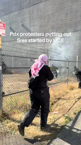 Chemical agents and tear gas canisters deployed by I.C.E were actively causing fires on the ground. Pdx protesters were putting fires out and mitigating potential harms to the apartment buildings and the school that are next door. Do not believe the headlines. #ice #pdx #iceoutofportland #nokings #portland #fyp #oregon 